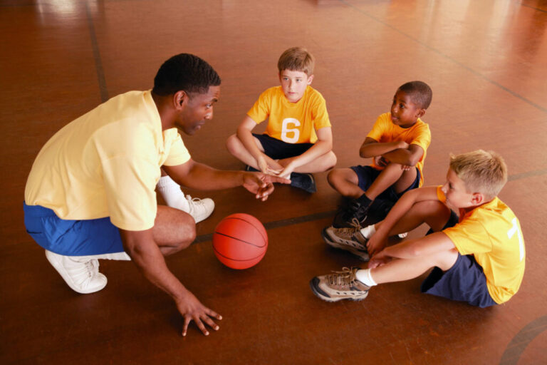 Basketball-coach-and-players-2-1024x682